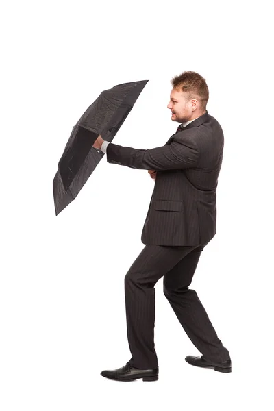 Homem elegante defendendo com guarda-chuva — Fotografia de Stock