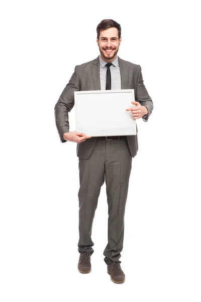 Elegante man met ingelijste board — Stockfoto