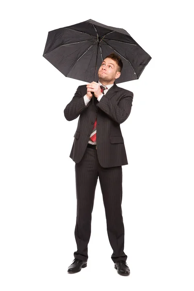 Puzzled up elegant man with umbrella Stock Image