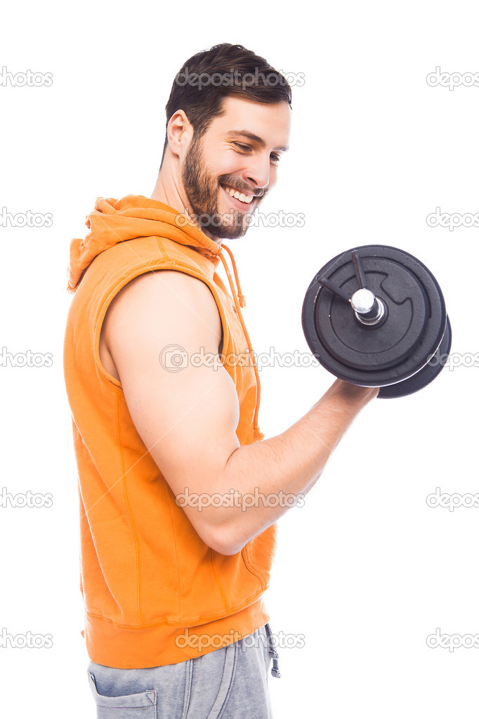 young man lifting dumbbell