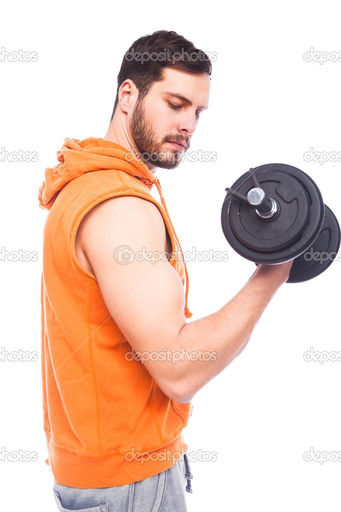 young man lifting dumbbell