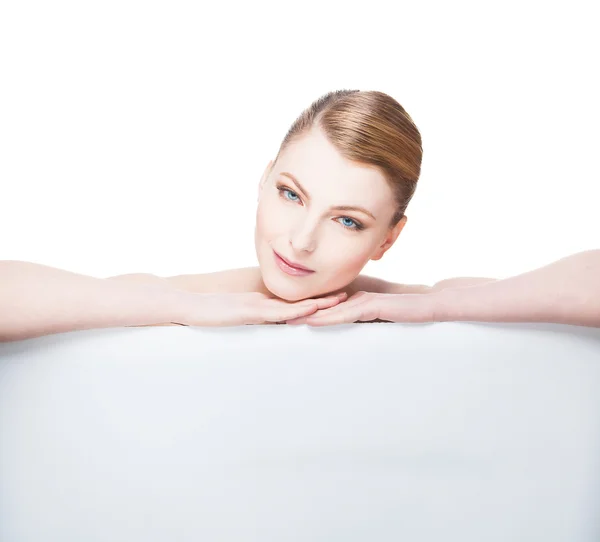 Beautiful expresive and natural woman lying on white panel — Stock Photo, Image