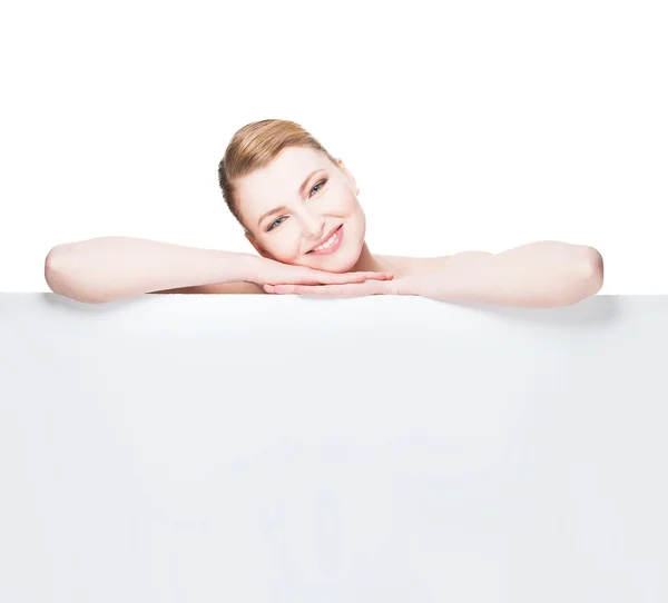 Beautiful expresive and natural woman lying on white panel — Stock Photo, Image