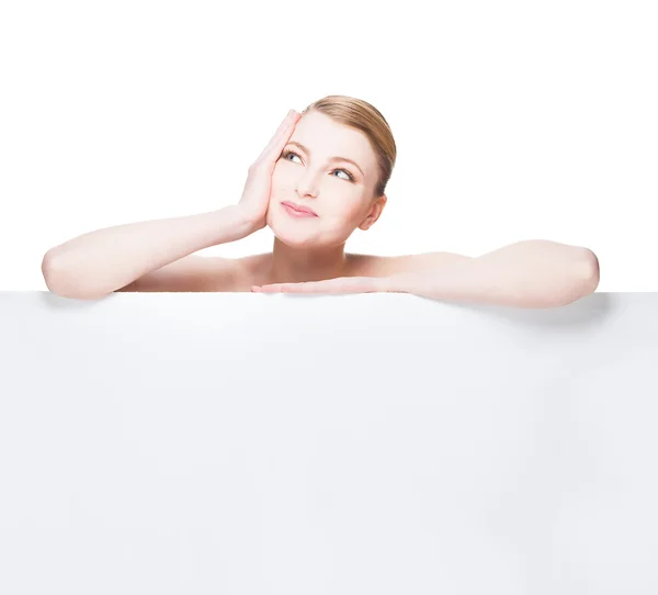 Beautiful expresive and natural woman lying on white panel — Stock Photo, Image