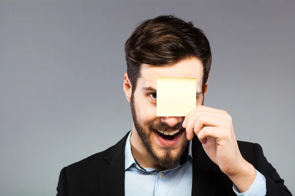 男の顔に postit — ストック写真