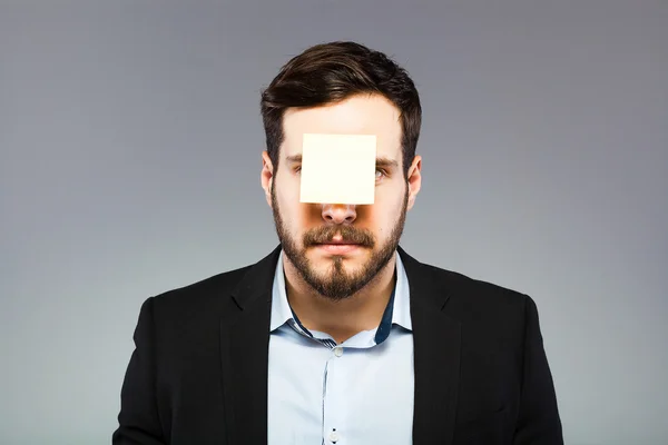 男の顔に postit — ストック写真