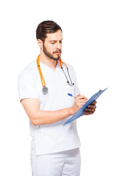 Handsome male doctor with clipboard isolated — Stock Photo, Image