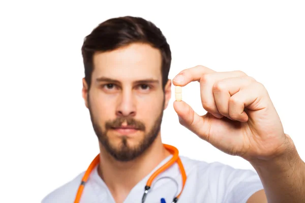 Medico con pillole in mano — Foto Stock