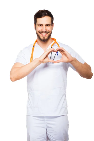 Médico mostrando sinal cardíaco — Fotografia de Stock