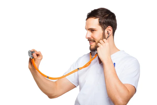 Male doctor listening with stethoscope — Stock Photo, Image