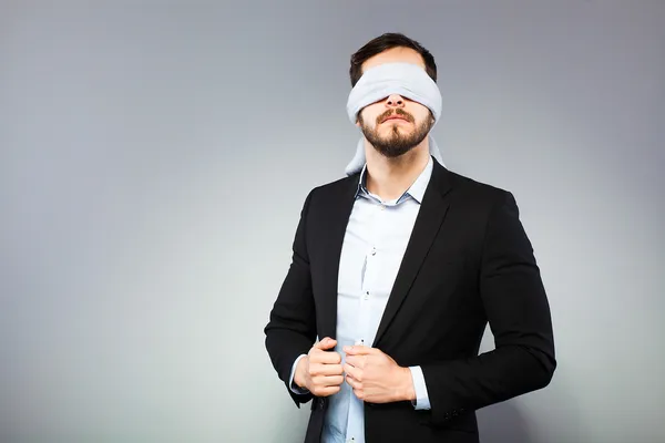 depositphotos_44815707-stock-photo-blindfolded-elegant-man.jpg
