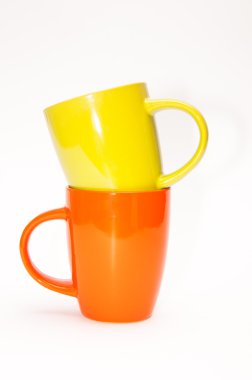 Sarı ve turuncu çay bardağı