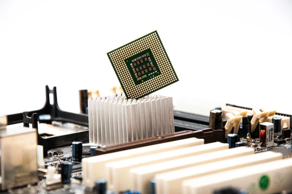 Desktop motherboard with CPU on a white background — Stock Photo, Image