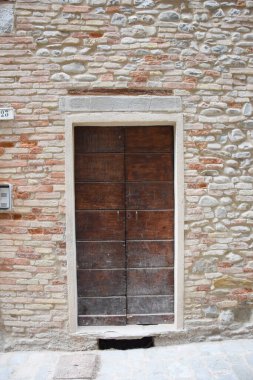 Collection of medieval wooden doors, photographed in Sant'angelo in Vado, a very ancient medieval and roman pesino located in Italy, precisely in the marche in the province of Pesaro and Urbino