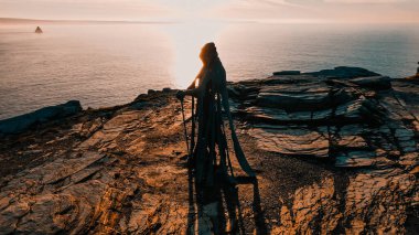 Aerial view around the Monument to King Arthur in Britain Monument close up on sea background.