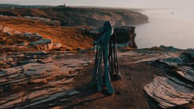 Aerial view around the Monument to King Arthur in Britain Monument close up on sea background 