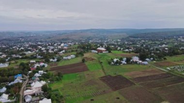 Flight over the houses in the Ukrainian village Aerial view.