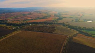 Sunset over the fields of western Ukraine. Aerial view.