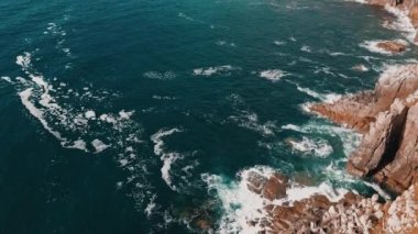 Aerial view over the Atlantic Ocean. Slow motion.