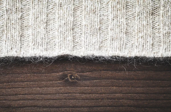 Wool sweater on wood — Stock Photo, Image