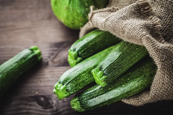 Zucchini in sack — Stock Photo, Image