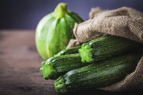 Zucchini in sack — Stock Photo, Image