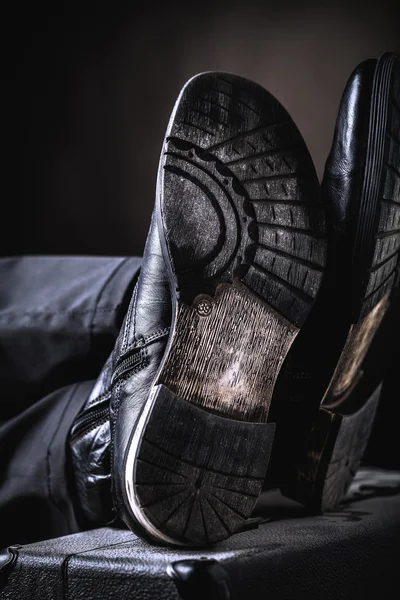 Leather boots on valise — Stock Photo, Image