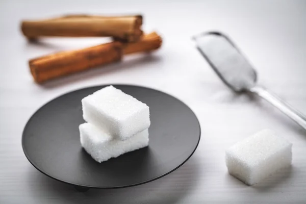 Kostka cukru a skořice — Stock fotografie
