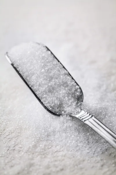 Açúcar e colher — Fotografia de Stock