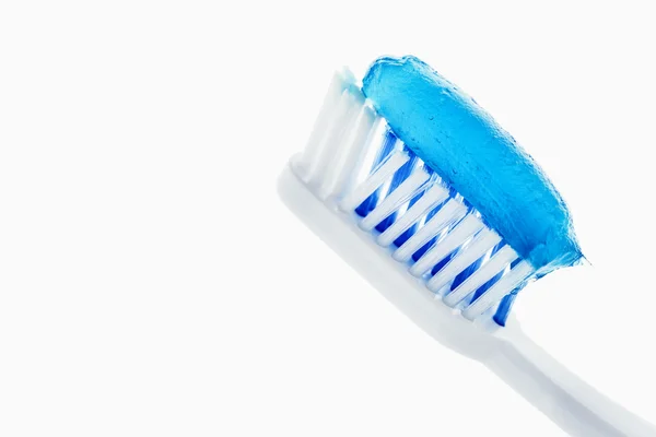 Зубная паста и зубная щетка — стоковое фото