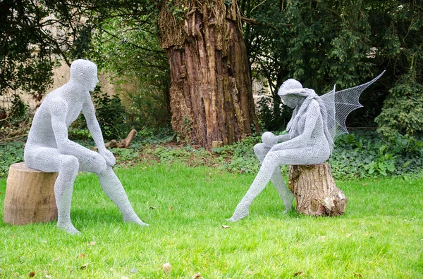 Adam ve peri teli heykelleri — Stok fotoğraf