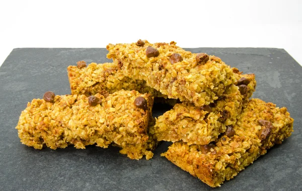 Stack of chocolate flapjack oat cakes — Zdjęcie stockowe