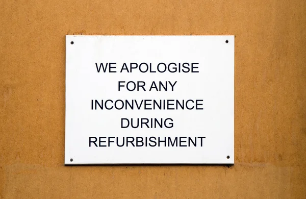 Refurbishment sign on wooden background — Stock Photo, Image