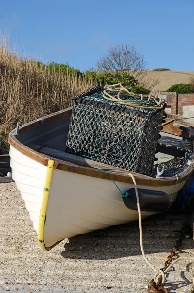 Small fishing boat with crab pot — Stock Photo, Image