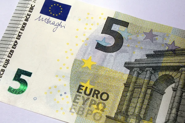 Monedas y billetes en euros —  Fotos de Stock