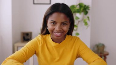 Screen POV laptop view of young woman listening on virtual video call. Teenager student girl having an interview online. High quality 4k footage