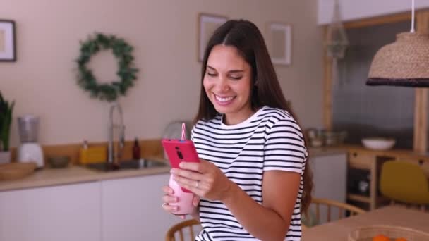 Happy Healthy Young Woman Drinking Strawberry Smoothie While Watching Funny — Wideo stockowe