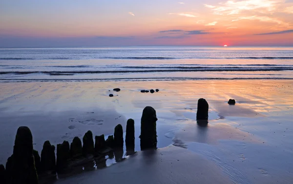 Puesta de sol en la playa — Foto de Stock