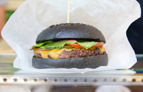 Delicious black hamburger — Stock Photo, Image
