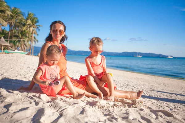 Mother and two adorable kids at beach on sunny day — Stock Photo, Image