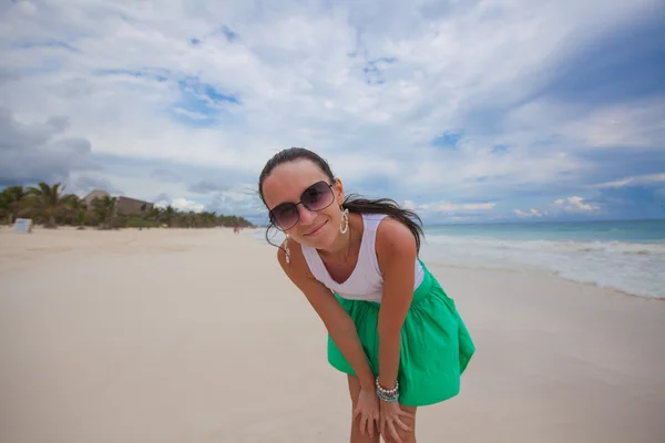 Closeup of a young beautiful woman on the white exotic beach — Stock Photo, Image