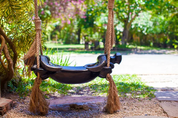 Close-up of a beautiful swing in the garden — Stock Photo, Image