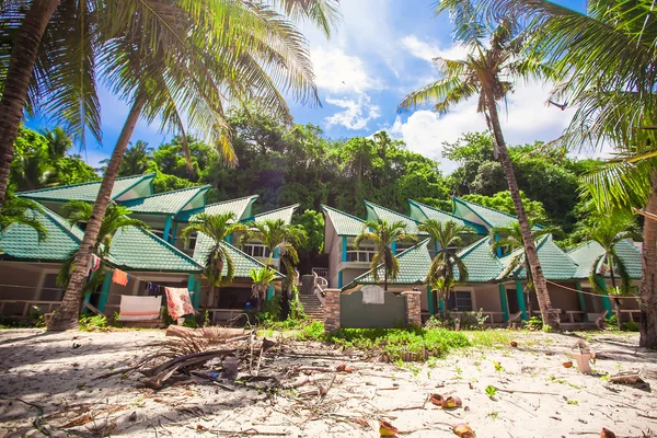 Abandoned and deserted hotel in the jungle on white beach — Stock Image Abandoned and deserted hotel in the jungle on white beach Royalty Free Stock Photos