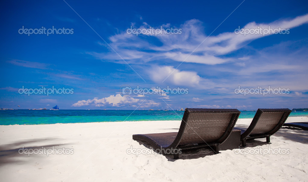 Beach Chairs on beautiful island in white sand plage