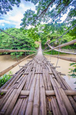 Hinged bridge over the River Loboc in Bohol, Philippines clipart