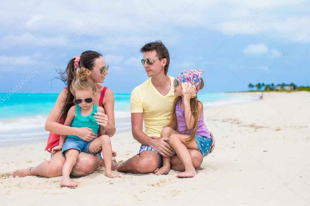 Happy family vacation on caribbean perfect beach