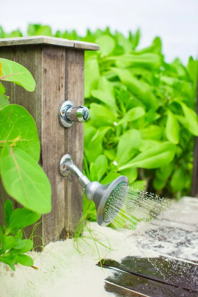 Close up outdoor beach shower at exotic resort — Stock Photo, Image