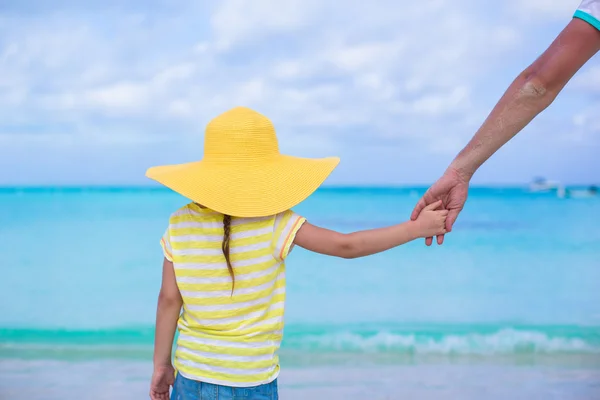 Close up of little girl holding her father hand — Stock Photo, Image