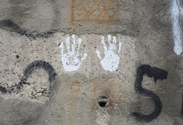 Hand prints on the wall