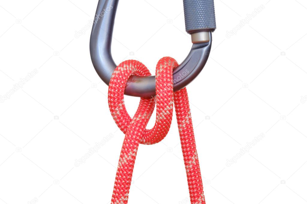 Munter hitch tied with red rope on carabiner, isolated on white background. This adjustable knot used in climbing is also called the Italian hitch, Mezzo Barcaiolo or the Crossing hitch.